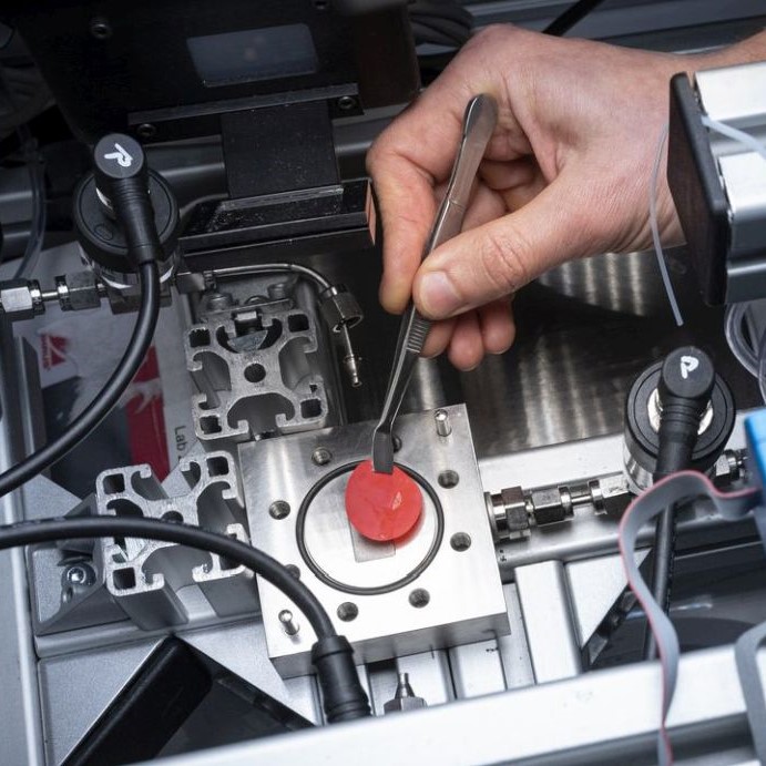 Insertion of the photocatalytic membrane into the membrane reactor. 